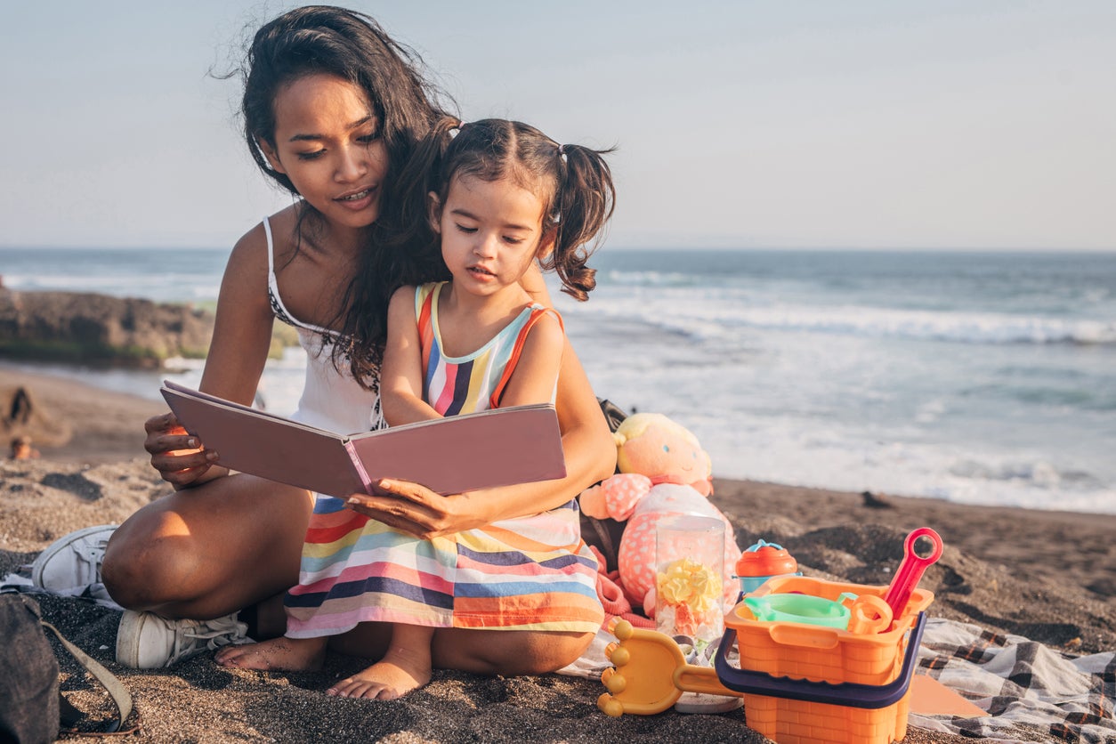 Mom and daughter on the beach