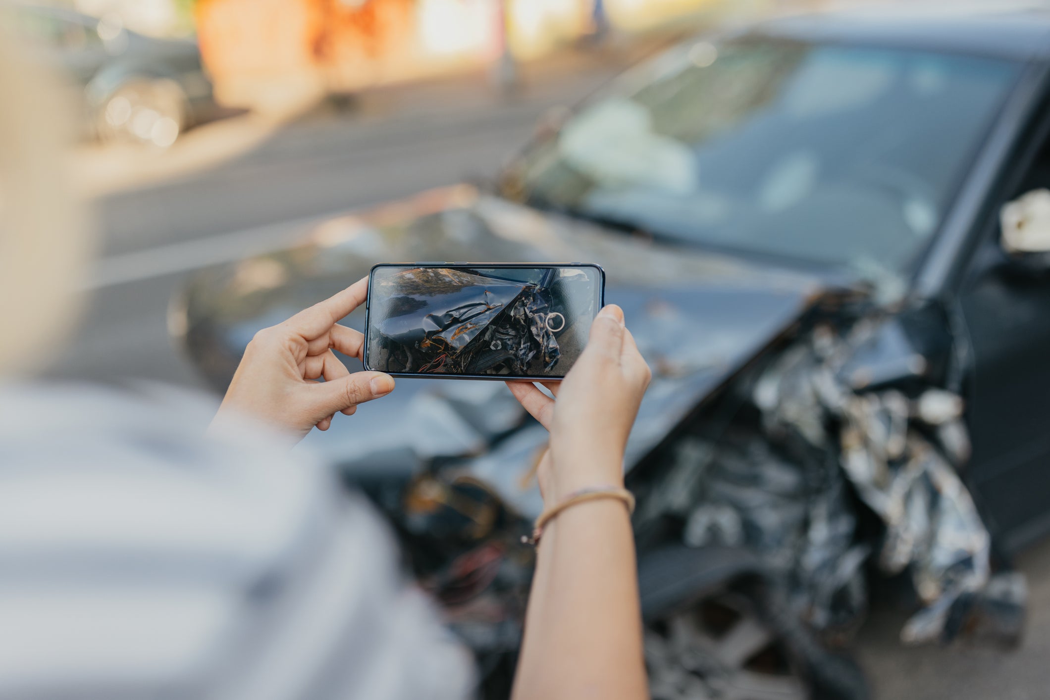 Taking photo of wrecked car