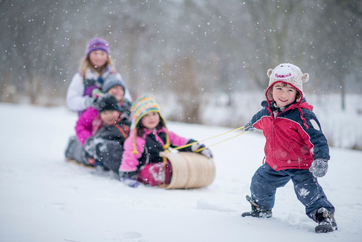 Children Going Sledding Together