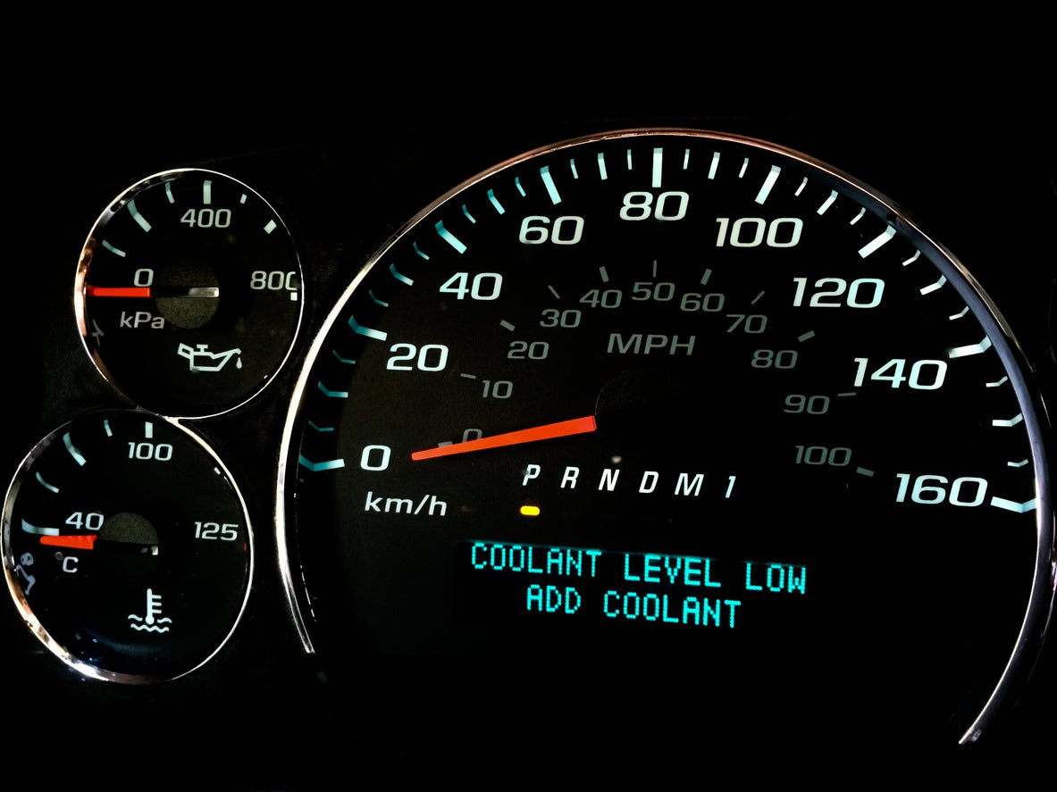 Coolant level low warning light
