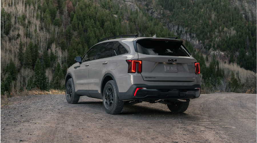 Side profile view of a 2026 Kia Sorento navigating highway traffic safely in Waukegan Illinois