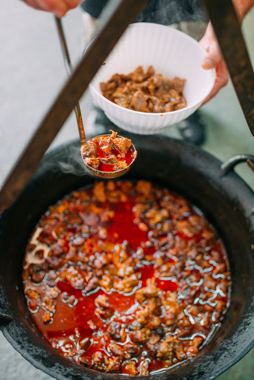 Cooking traditional goulash and beef stew