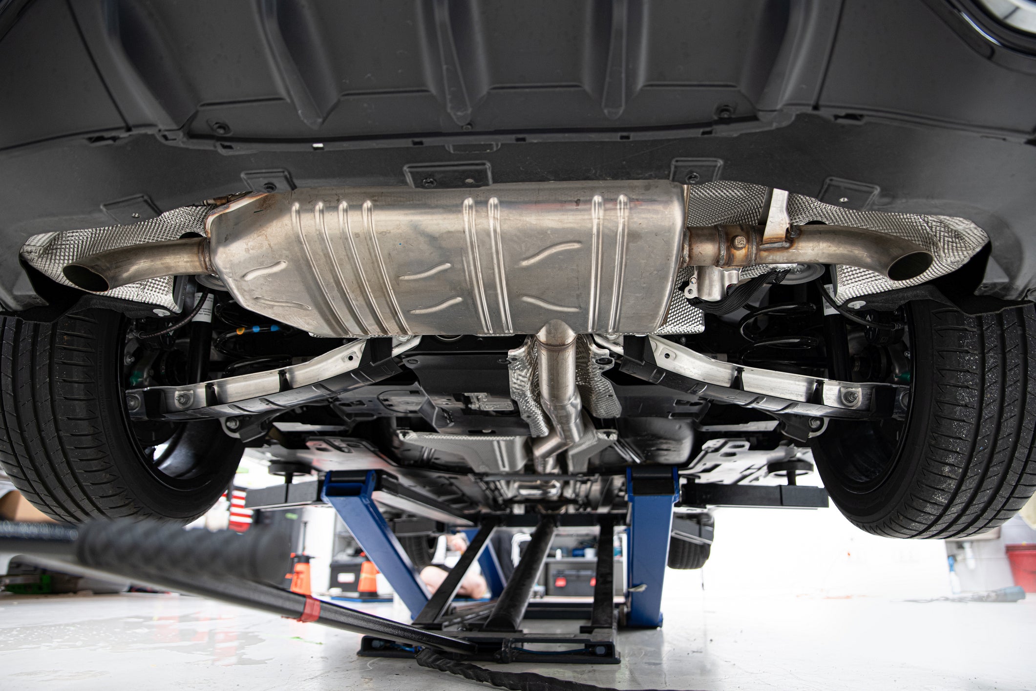 New modern car chassis. Car on jack in car service.