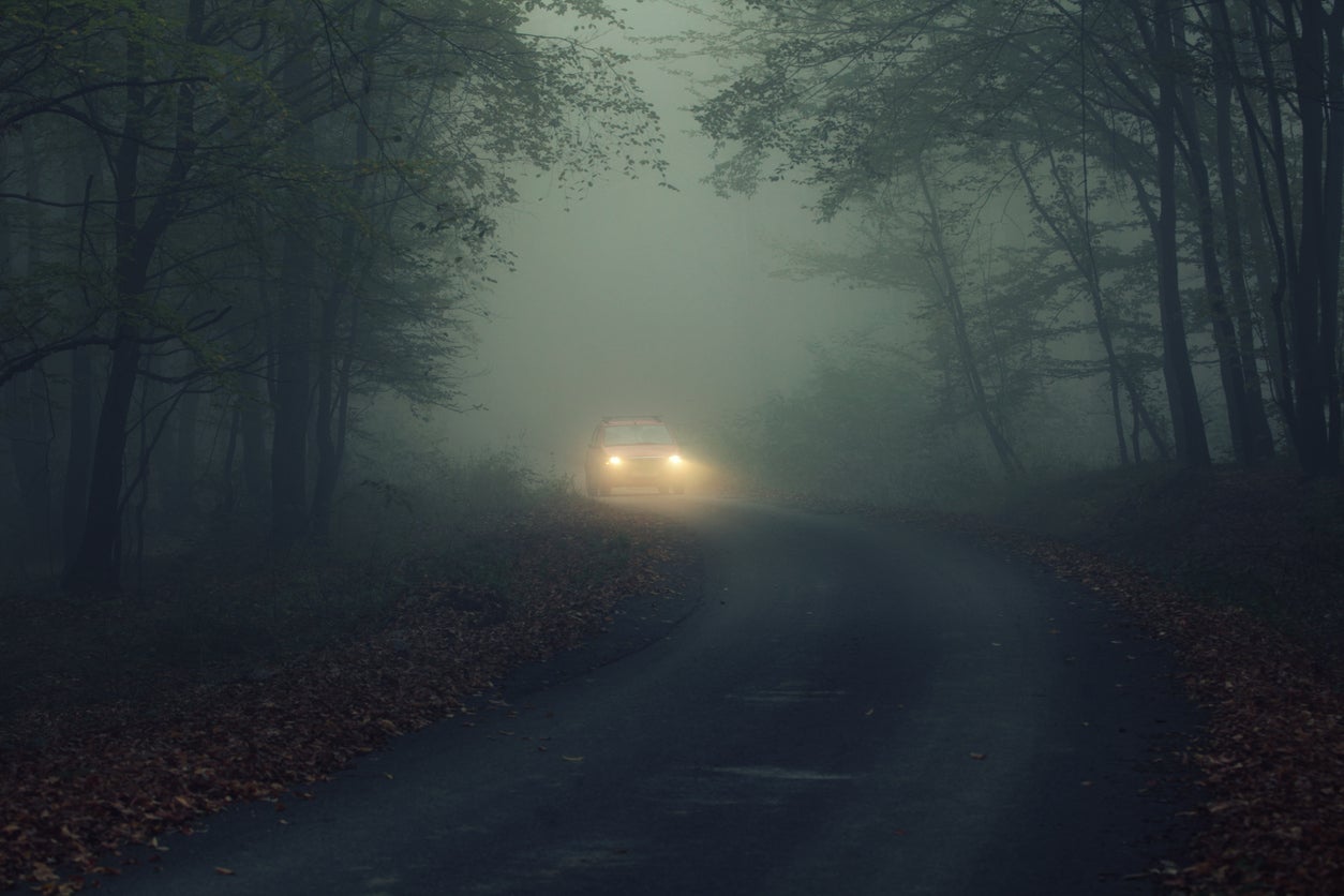 car in fogy night