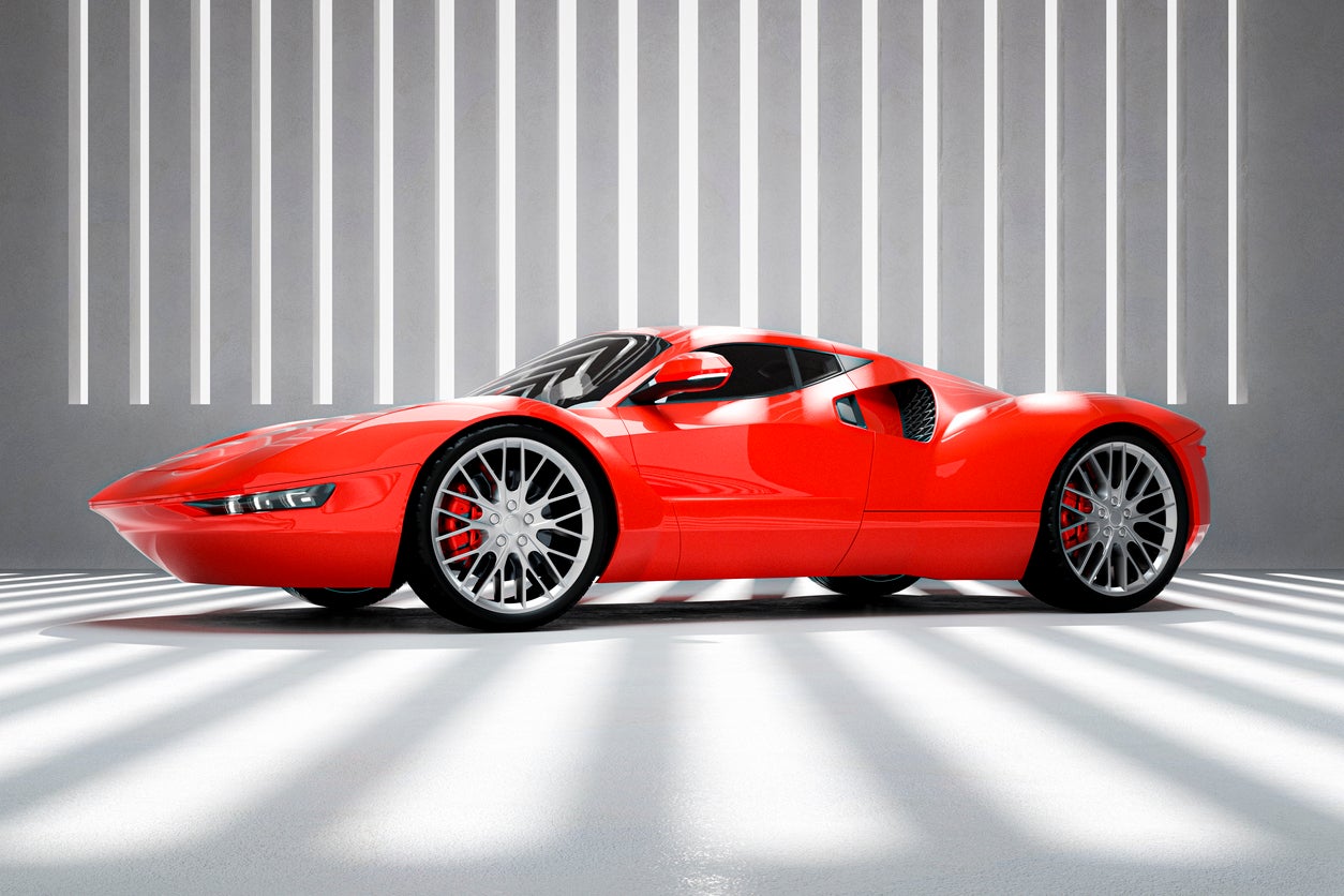 Generic modern sports car in concrete garage