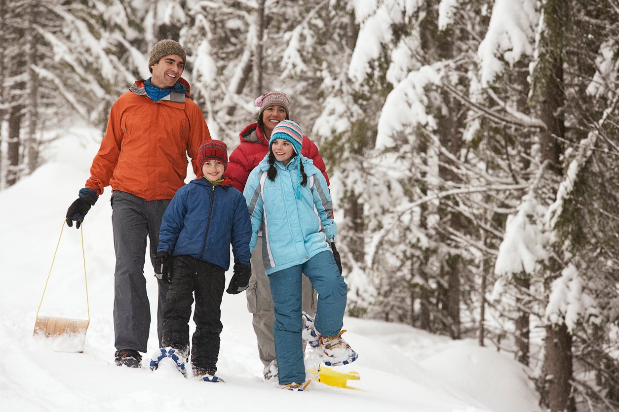Family walking in the snow