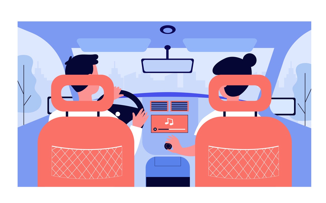 People listening to music while travelling by car