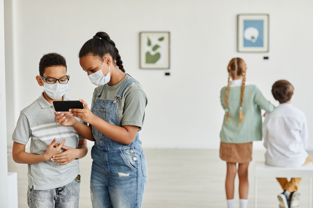 Children Wearing Masks in Art Gallery