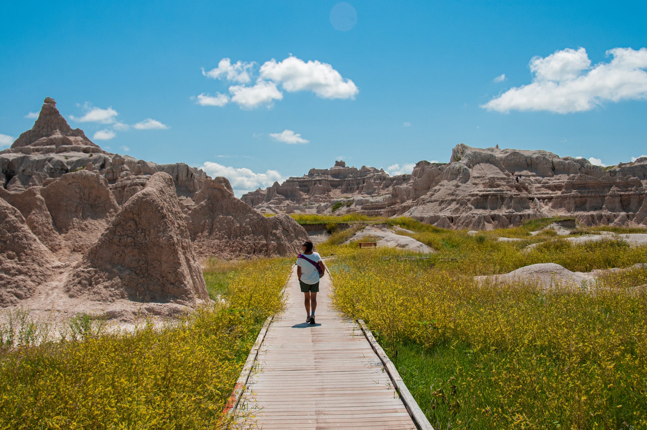 Woman hiking through the Badlands National Park in South Dakota