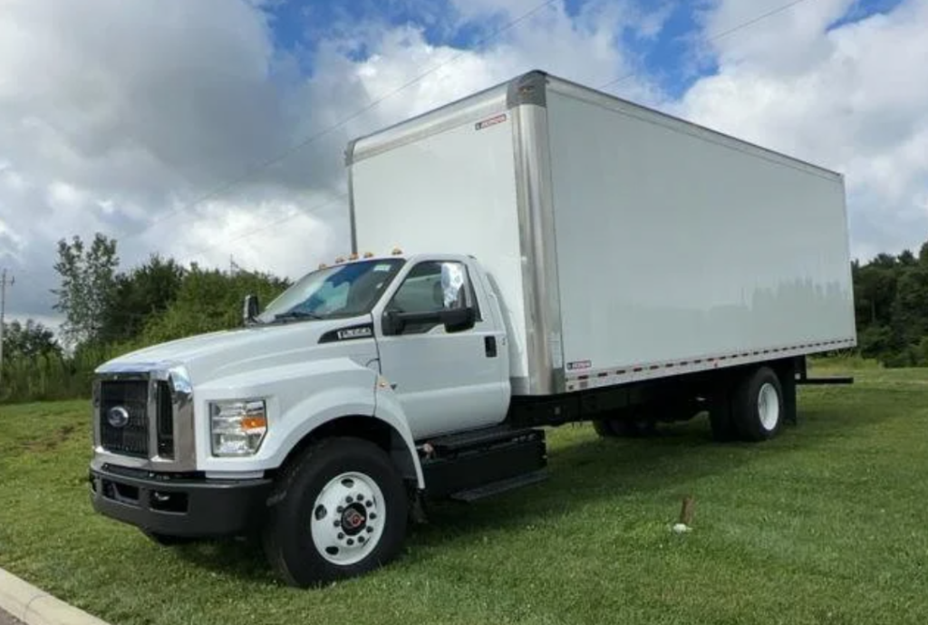 A white 2024 Ford F-650SD parked in grass at the Coughlin Ford of Pataskala
dealership in Pataskala, OH.