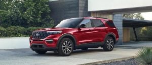 A red 2022 Ford Explorer parked on a driveway.