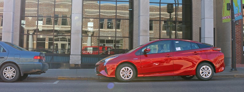 photo of 2016 toyota prius parked on a street