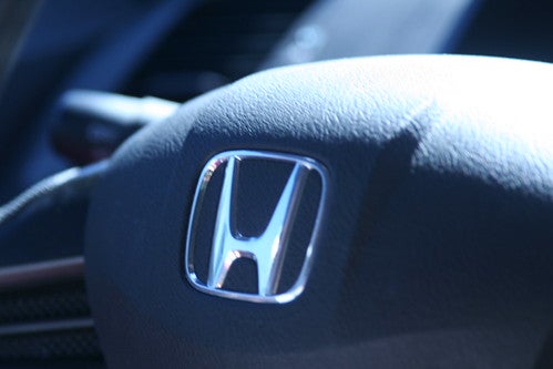 A Honda logo on the wheel of an Odyssey