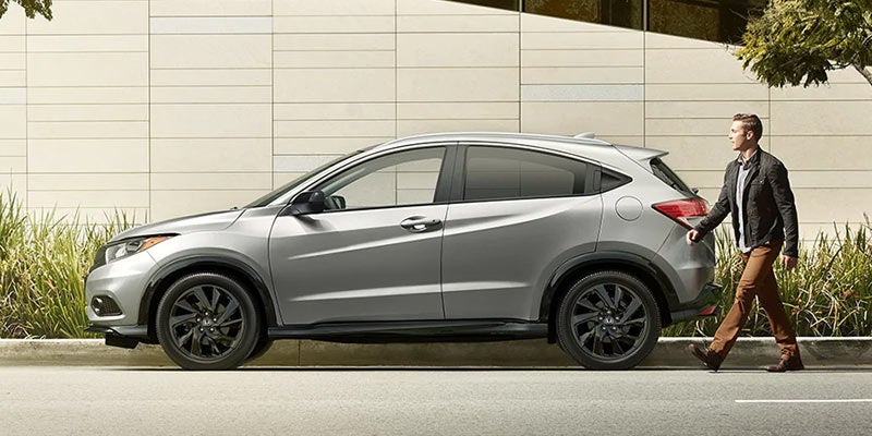 Silver Honda HR-V Parallel Parked on a Street