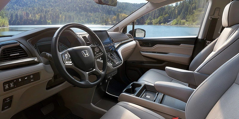 Interior Photo of the Honda Odessey 2022 with the Radio and internal console