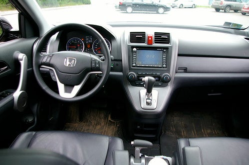 Inside of a Honda car showing the Console and active HondaLink