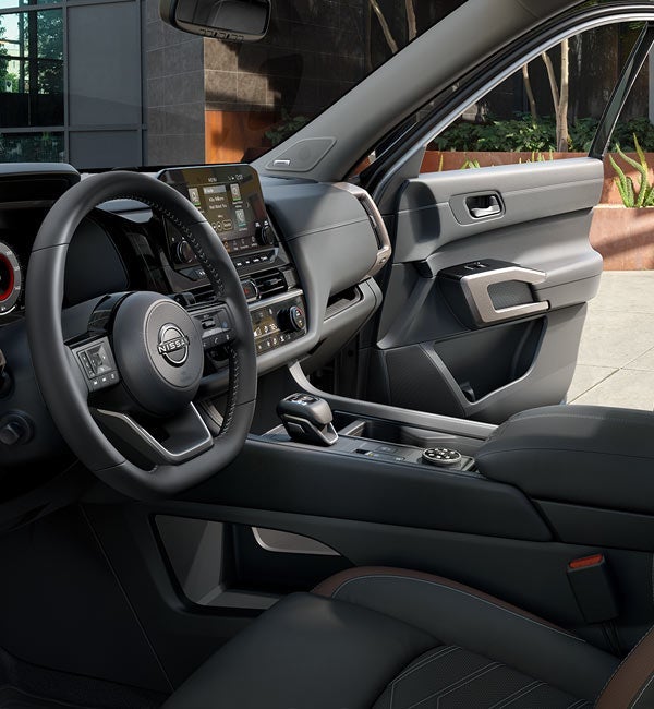 Driver's side of a Nissan Pathfinder interior