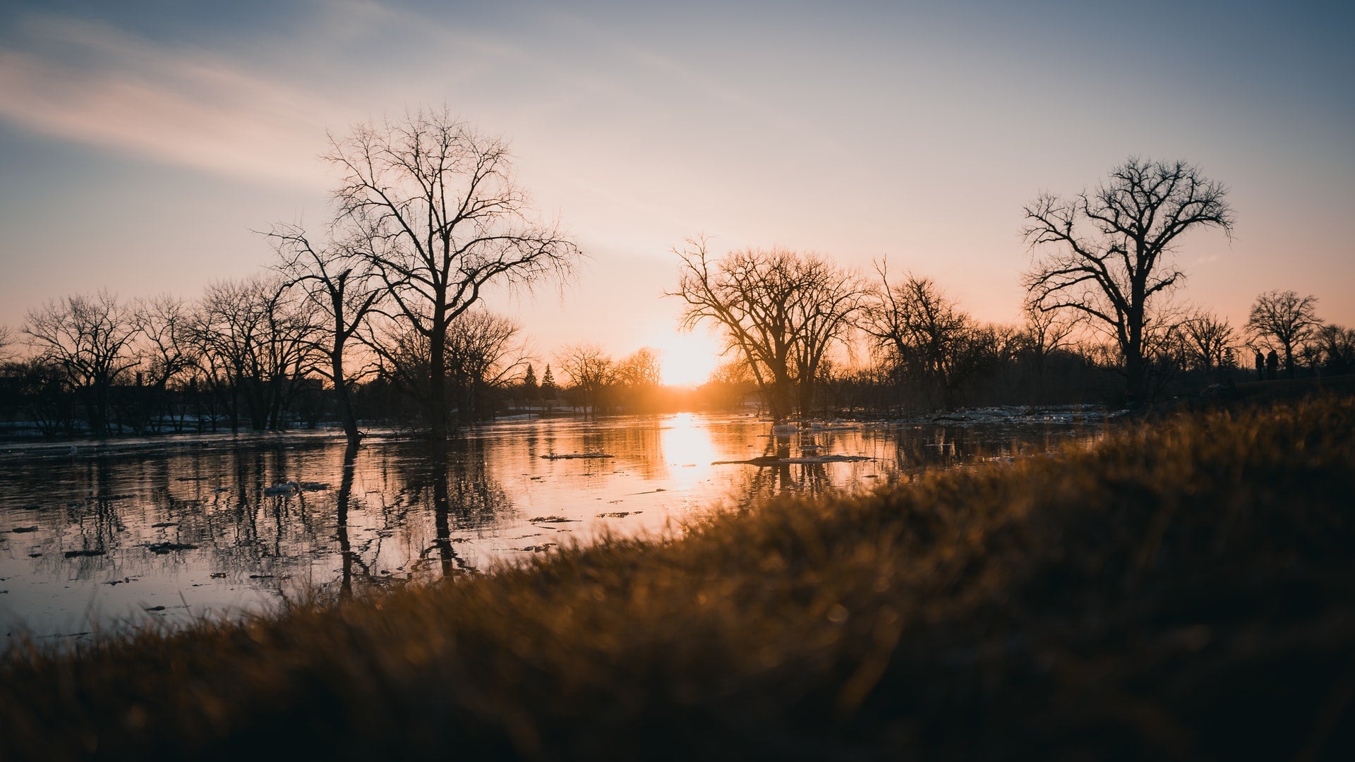 Sunset over red river during winter