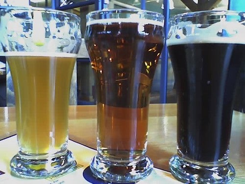 Three glasses of beer next to each other