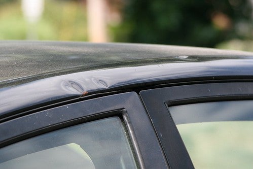 Car Roof with Hail Damage
