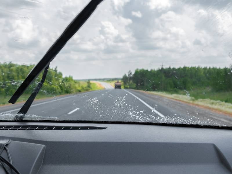 view of windshield from inside a moving vehicle