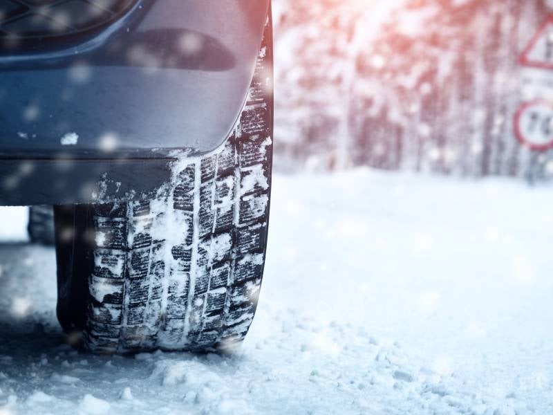 tires cover in snow during the winter