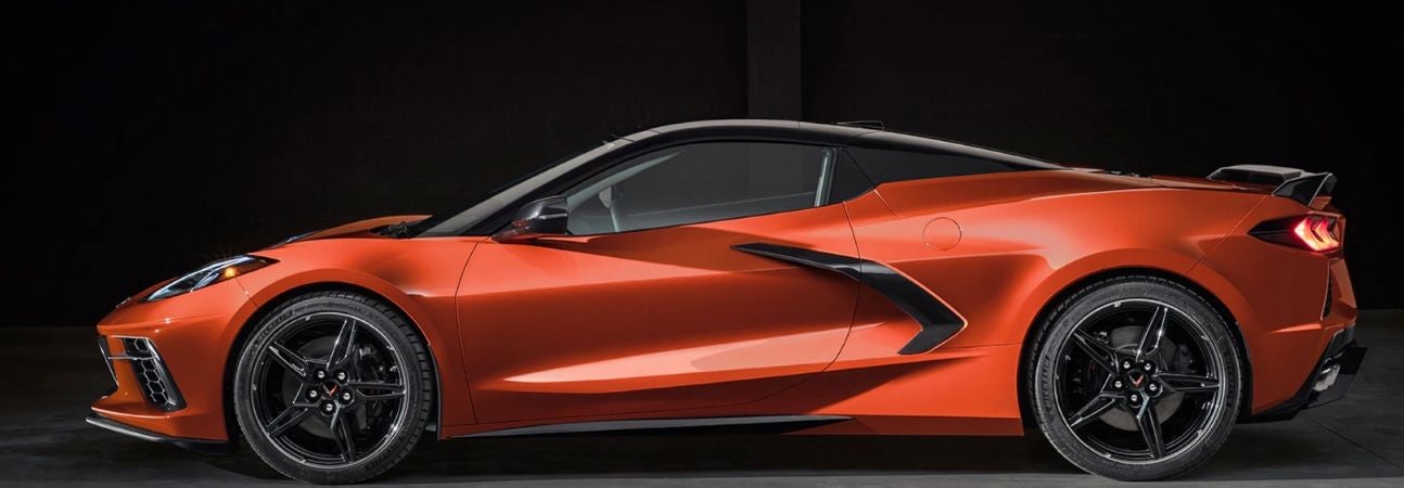 2020 chevrolet corvette parked in a dark room