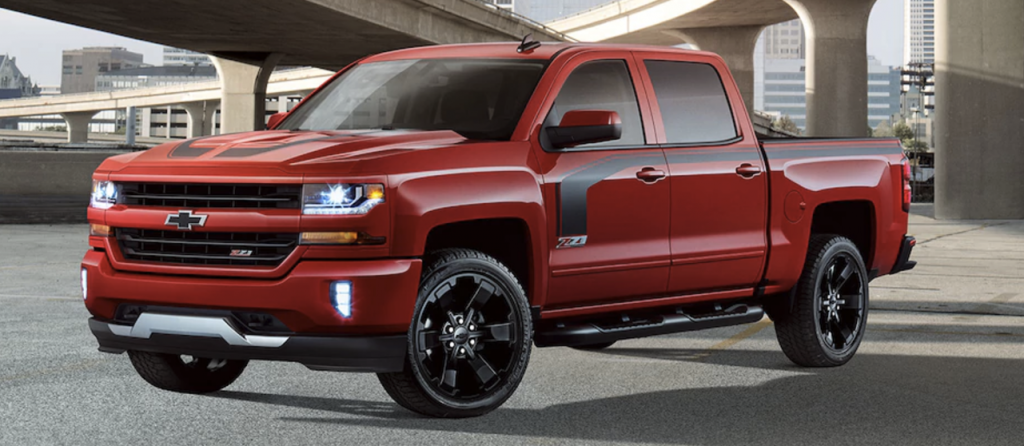 A red Chevy Silverado 1500 Rally 2 parked outside