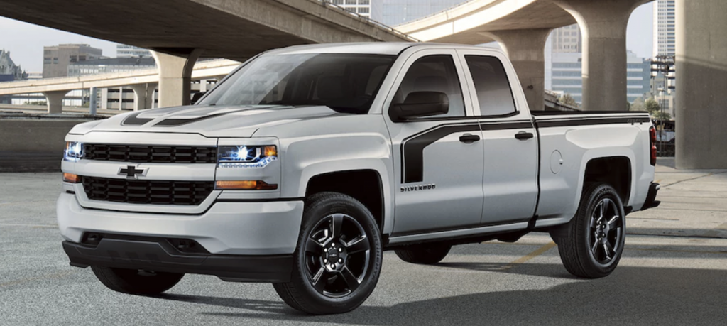 A silver Chevy Silverado 1500 Rally 1 parked outside