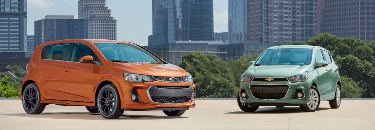 2018 Chevy Sonic on the left and the 2018 Chevy Spark on the right