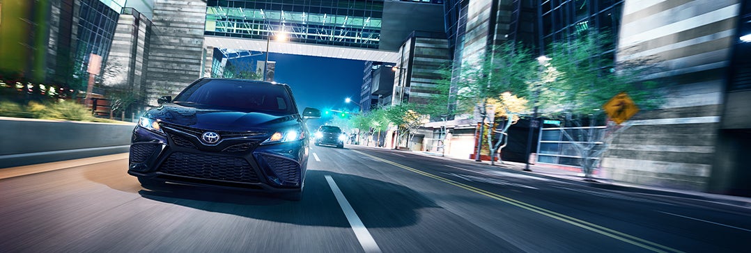Model Features of the 2022 Toyota Camry at Bennett Toyota | City night driving with the Camry