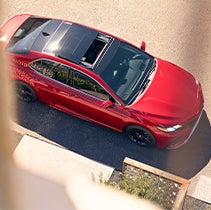 Model Features of the 2022 Toyota Camry at Bennett Toyota | Birds eye view of Camry's sunroof