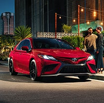 Model Features of the 2022 Toyota Camry at Bennett Toyota | Camry at restaurant during night