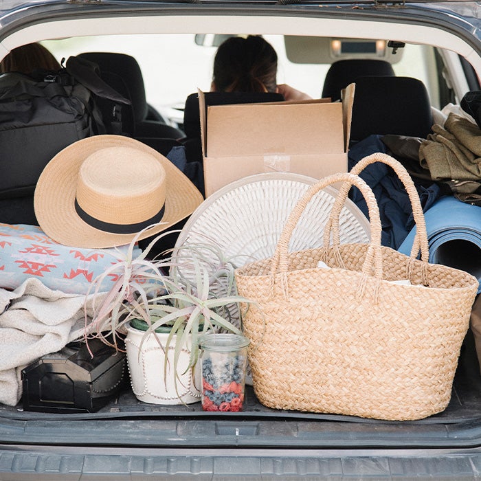 Tips for spring cleaning your car at Bennett Toyota of Allentown | Cluttered Trunk Filled With Various Items