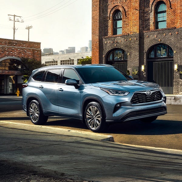 Model Features of the 2021 Toyota Highlander at Bennett Toyota | Blue 2021 Toyota Highlander Street Parked in City