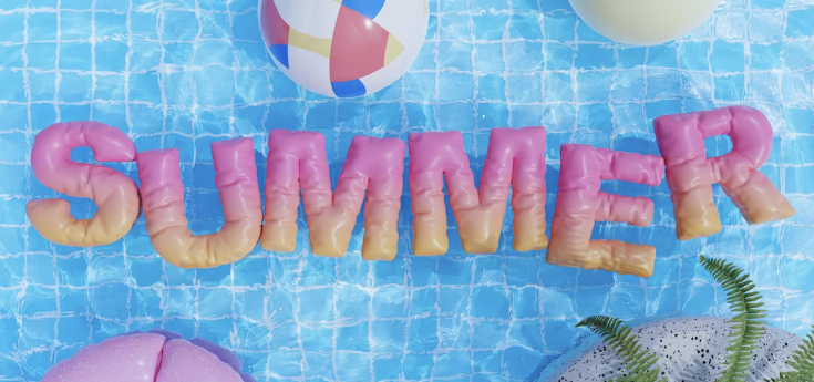 Inflatable summer letters floating in a swimming pool