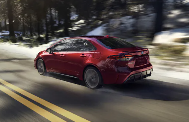 2026 Toyota Corolla in red running on street