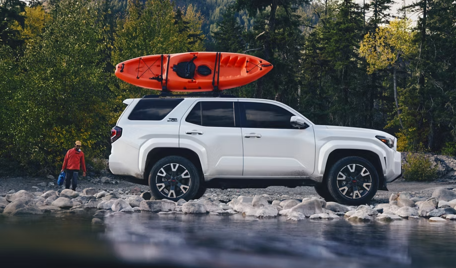 White Toyota With a Kayak