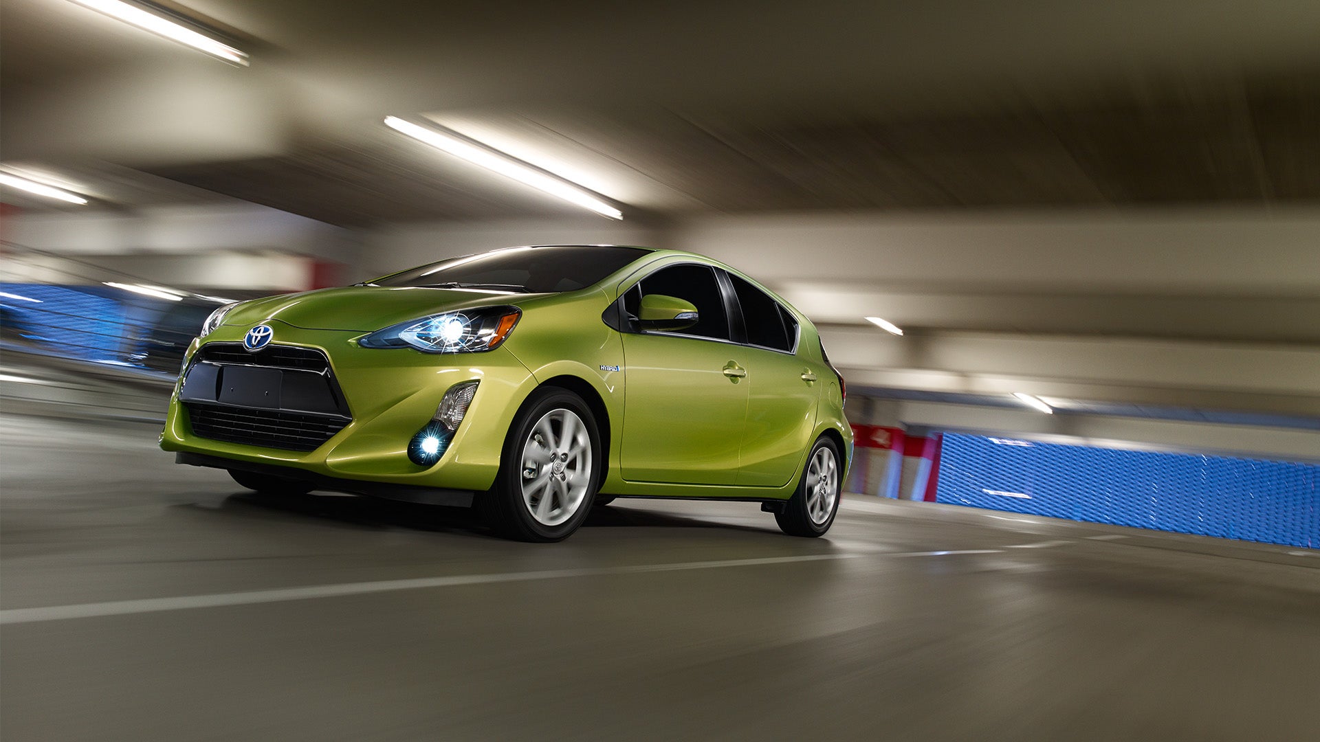 Image of a green 2019 Toyota Prius.