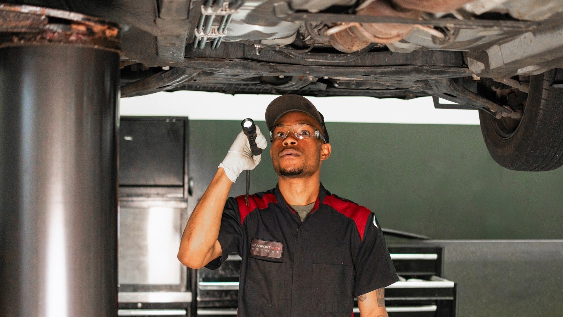 Technician Inspecting a Vehicle | Passport Toyota in Suitland MD