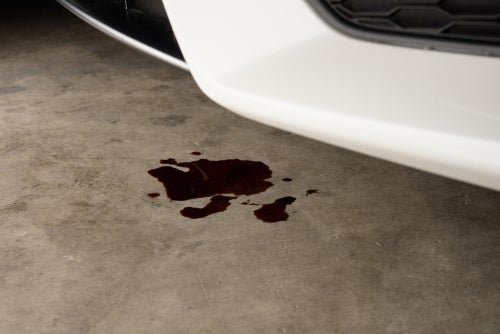 Puddles in Your Garage or Driveway Signs Your Transmission Fluid Is Low